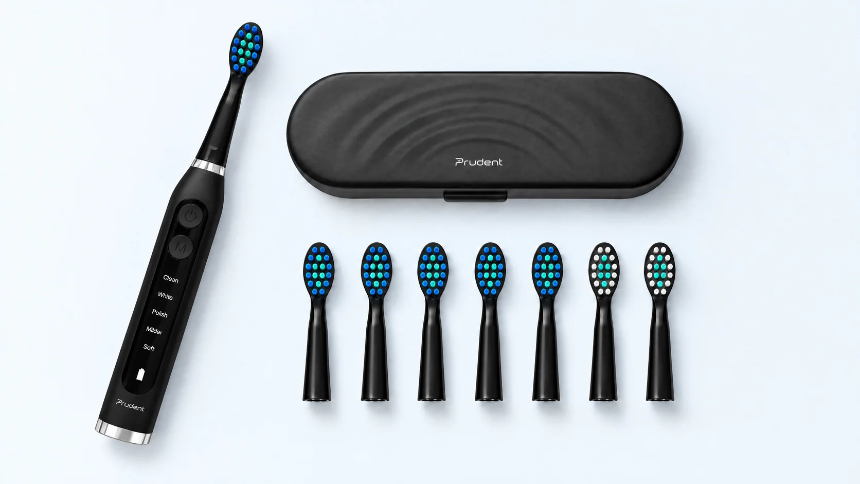 Black Prudent Sensitive sonic toothbrush with its travel case and replacement brush heads on a light surface